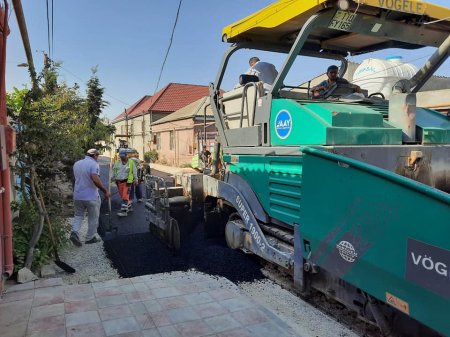 Suraxanının Hövsan qəsəbəsində yolların asfaltlanması davam etdirilir - Fotolar
